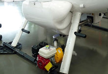 Load image into Gallery viewer, MD500 spray system on helicopter - close up in hangar